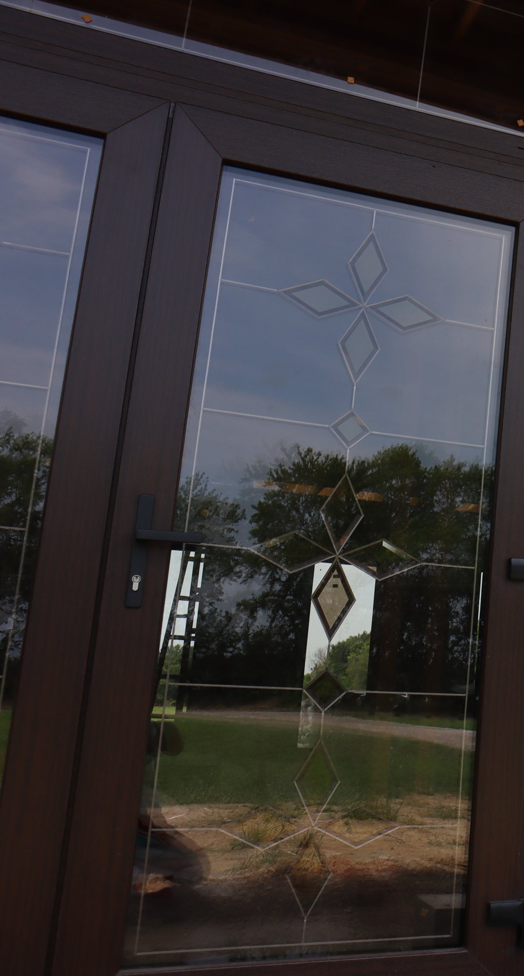 Entry door with decorative beveled glass, interior view